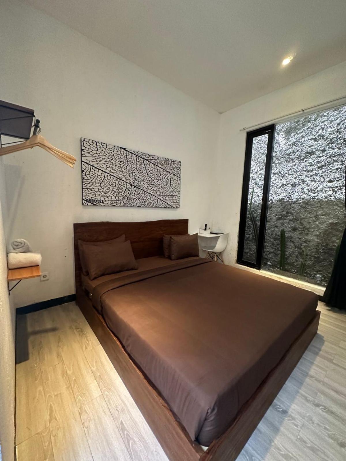 Escotel Tempekan Guest House Canggu Buitenkant foto