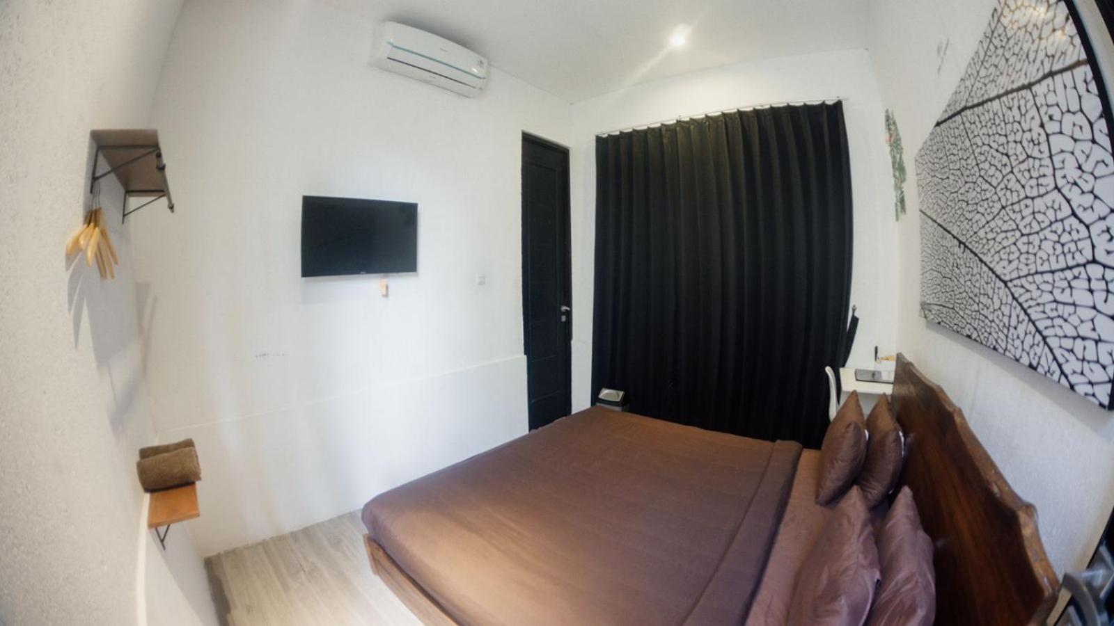 Escotel Tempekan Guest House Canggu Buitenkant foto